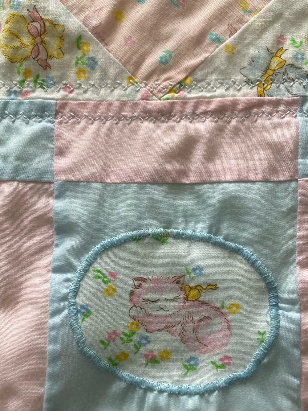 Handmade pastel kitten print baby quilt